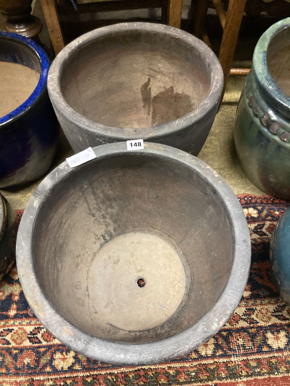 A pair of glazed earthenware garden planters, diameter 38cm